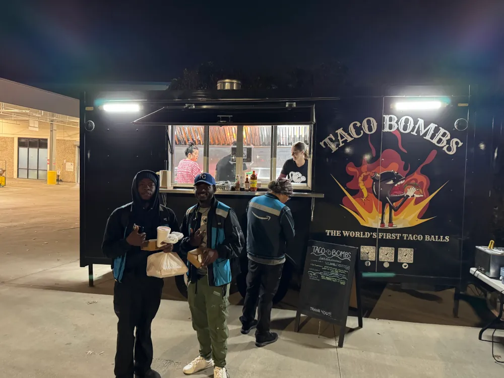 Image of Amazon employees getting food from food truck